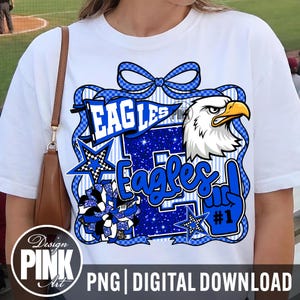 May include: White t-shirt featuring a blue and white graphic design with the word "Eagles" and an eagle head. The design includes stars, a bow, and a foam finger with the number one. The shirt is a digital download.