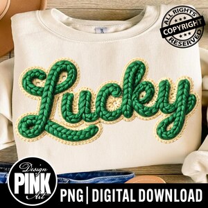 May include: Cream-colored sweatshirt with the word "Lucky" in green, textured, stitched letters. The letters are outlined in a light tan color. The image also includes a copyright notice and the text "PNG | DIGITAL DOWNLOAD".