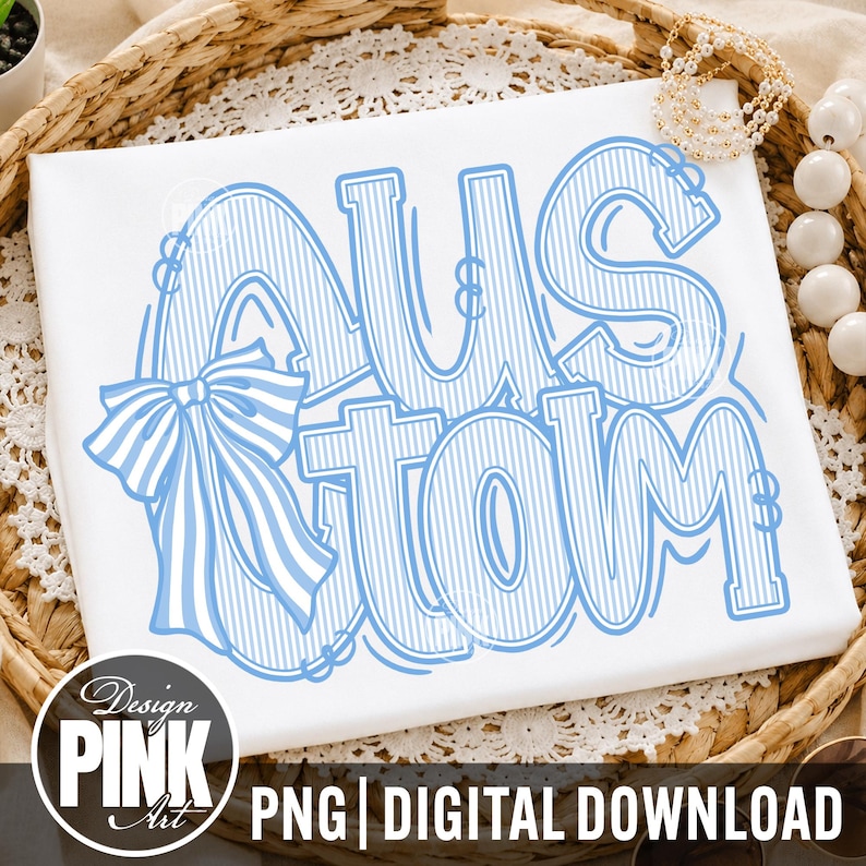 May include: White t-shirt with the word "CUSTOM" in light blue, outlined with a bow on the left side. The text is in a bold, playful font. The bottom of the image has the text "PNG | DIGITAL DOWNLOAD" and a logo.