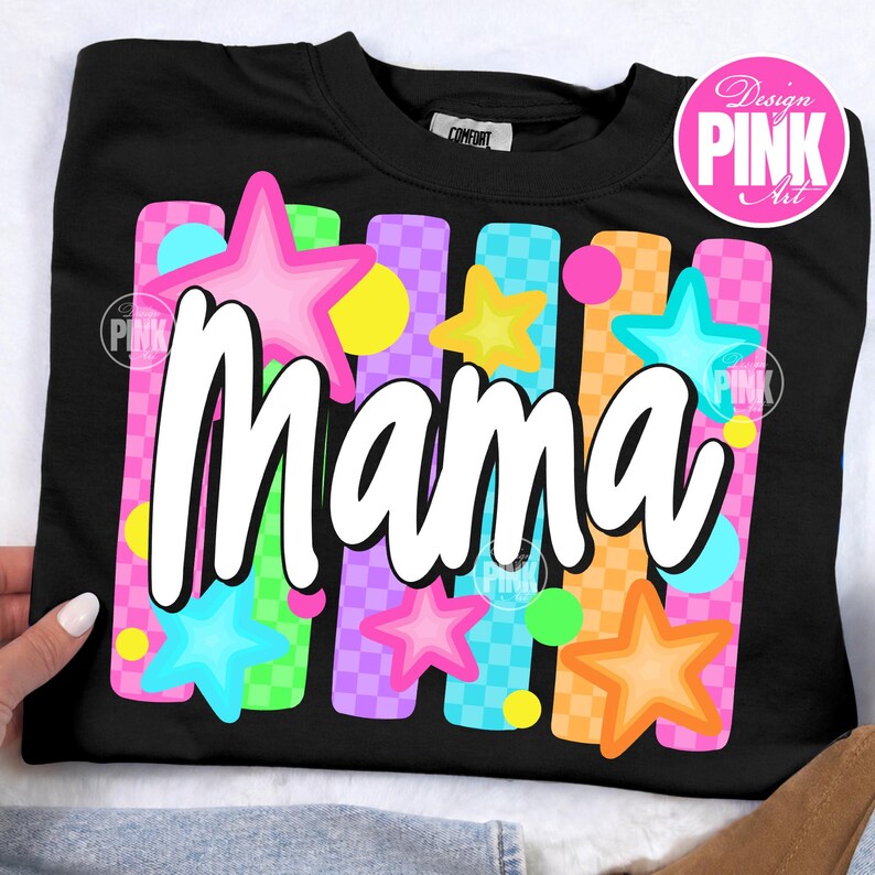 May include: Black sweatshirt with the word "Mama" in white script. The design includes colorful vertical stripes, stars, and circles in pink, blue, yellow, and orange. The sweatshirt has a crew neck and a tag that says "Comfort".