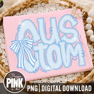May include: A pink t-shirt with the word "CUSTOM" in large, blue, outlined letters with a bow. The text is in a playful font with vertical stripes. The design includes the text "PNG | DIGITAL DOWNLOAD" and a logo that says "Design PINK Art".