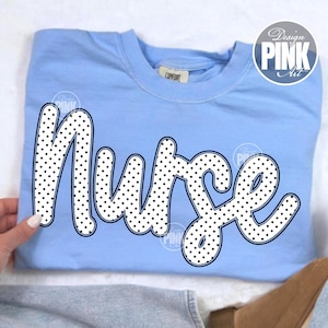 Könnte beinhalten: Ein Set aus drei Keramikbechern mit gesprenkelter, matter Oberfläche. Die Becher sind in Creme-, Hellgrau- und Dunkelgrautönen gehalten. Jeder Becher hat ein schlichtes, minimalistisches Design.