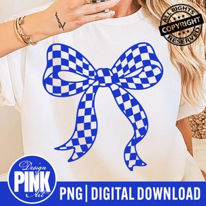 May include: White t-shirt featuring a large blue and white checkered bow design. The shirt has a round neckline and short sleeves. The words "Design Pink Art" are in a blue circle at the bottom of the shirt. The words "PNG | DIGITAL DOWNLOAD" are below the circle.