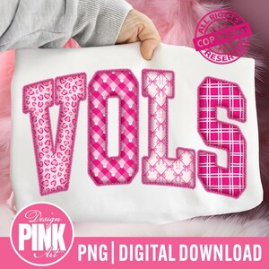 May include: A white fabric with the word "VOLS" in pink letters. The letters have different patterns: leopard print, gingham, bow pattern, and plaid. The image also includes the text "Design PINK Art" and "PNG | DIGITAL DOWNLOAD".