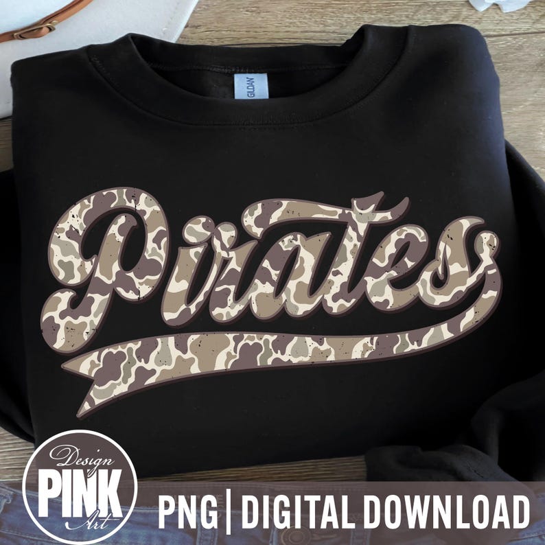May include: Black sweatshirt with the word "Pirates" in a camouflage pattern across the front. The text has a retro, collegiate style. The sweatshirt also has a "Design Pink Art" logo and "PNG | DIGITAL DOWNLOAD" text.