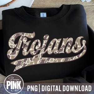 May include: Black crewneck sweatshirt with the word "Trojans" in a camouflage pattern across the front. The text has a brown outline and a curved banner beneath it. The sweatshirt has a tag that says "Gildan".