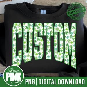 May include: Black sweatshirt with the word "CUSTOM" in large, bold, green-outlined letters filled with a pattern of green shamrocks. The design includes a copyright stamp and the text "PNG | DIGITAL DOWNLOAD".