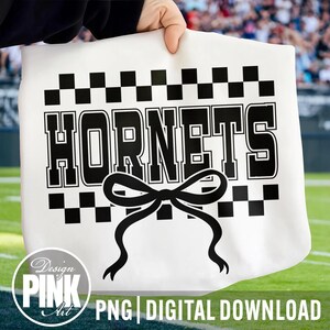 May include: White tote bag with the word "HORNETS" in bold black letters, a black bow, and a black and white checkered border. The words "Design Pink Art" and "PNG DIGITAL DOWNLOAD" are also visible.