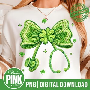 May include: White sweatshirt featuring a large green crochet bow and stethoscope design. The bow is adorned with a four-leaf clover and surrounded by green shamrocks and stars. The text "Design PINK Art" and "PNG | DIGITAL DOWNLOAD" are at the bottom.