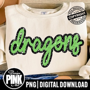 May include: Cream-colored sweatshirt with the word "Dragons" in a green glitter font outlined in black glitter. The design is centered on the front of the shirt. The image also includes a copyright notice and the text "PNG | DIGITAL DOWNLOAD".