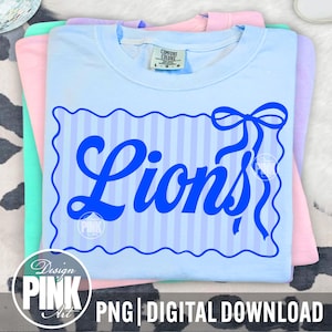May include: A stack of pastel-colored t-shirts. The top shirt is light blue with a blue design that says "Lions" in a script font, with a bow and striped background. The bottom of the image has the text "PNG | DIGITAL DOWNLOAD".