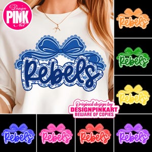 May include: White sweatshirt with a blue bow and the word "Rebels" in a floral design. The design includes the text "Design Pink Art" and "Original design by DESIGNPINKART BEWARE OF COPIES". Additional color variations of the design are also shown.