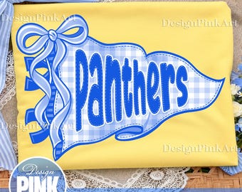 May include: A yellow t-shirt featuring a blue and white gingham pennant graphic with the word "PANTHERS" in bold blue letters. The design includes a blue ribbon bow attached to the left side of the pennant and the text "DesignPinkArt".