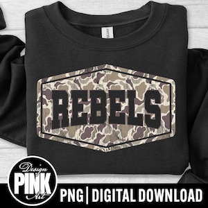 May include: Black sweatshirt with a camouflage design and the word "REBELS" in bold, dark letters. The design is set within a distressed, hexagonal frame. The bottom of the image has the text "PNG | DIGITAL DOWNLOAD".