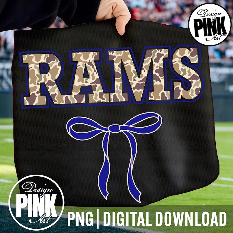 May include: Black tote bag featuring the word "RAMS" in camouflage print with a blue outline. A blue ribbon design is below the text. The bag has the text "PNG DIGITAL DOWNLOAD" at the bottom, with the "Design PINK Art" logo.