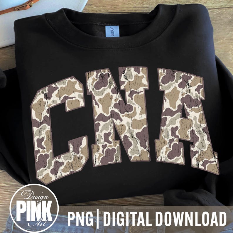 May include: Black sweatshirt with the letters "CNA" in a camouflage pattern. The letters are in a bold, collegiate-style font. The sweatshirt has a crew neck and long sleeves. The bottom of the image has the text "PNG | DIGITAL DOWNLOAD" and a logo.