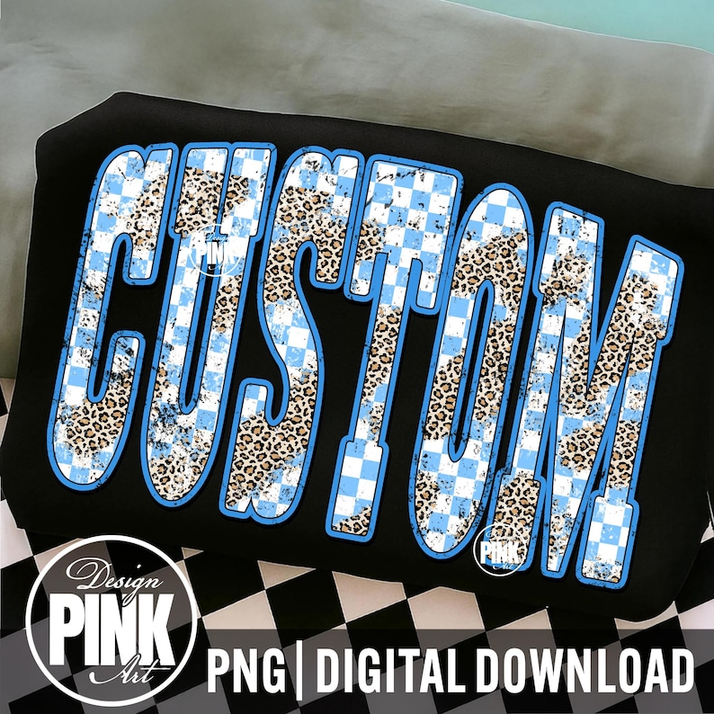 May include: Black graphic design featuring the word "CUSTOM" in a bold, outlined font. The letters are filled with a combination of light blue checkered patterns and leopard print. The design includes a "Design PINK Art" logo and the text "PNG | DIGITAL DOWNLOAD".
