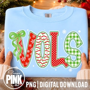 PNG de Navidad de los Vols, PNG de Espíritu Escolar de los Vols, PNG de Retazos Navideños de los Vols, PNG de Lazo Coqueto Rojo y Verde, Camiseta de Mascota Navideña