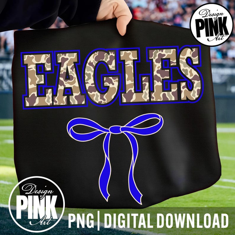 May include: Black tote bag with the word "EAGLES" in camouflage print with a blue outline. A blue bow is below the word. The words "PNG | DIGITAL DOWNLOAD" are at the bottom. The Design Pink Art logo is in the upper right and lower left corners.