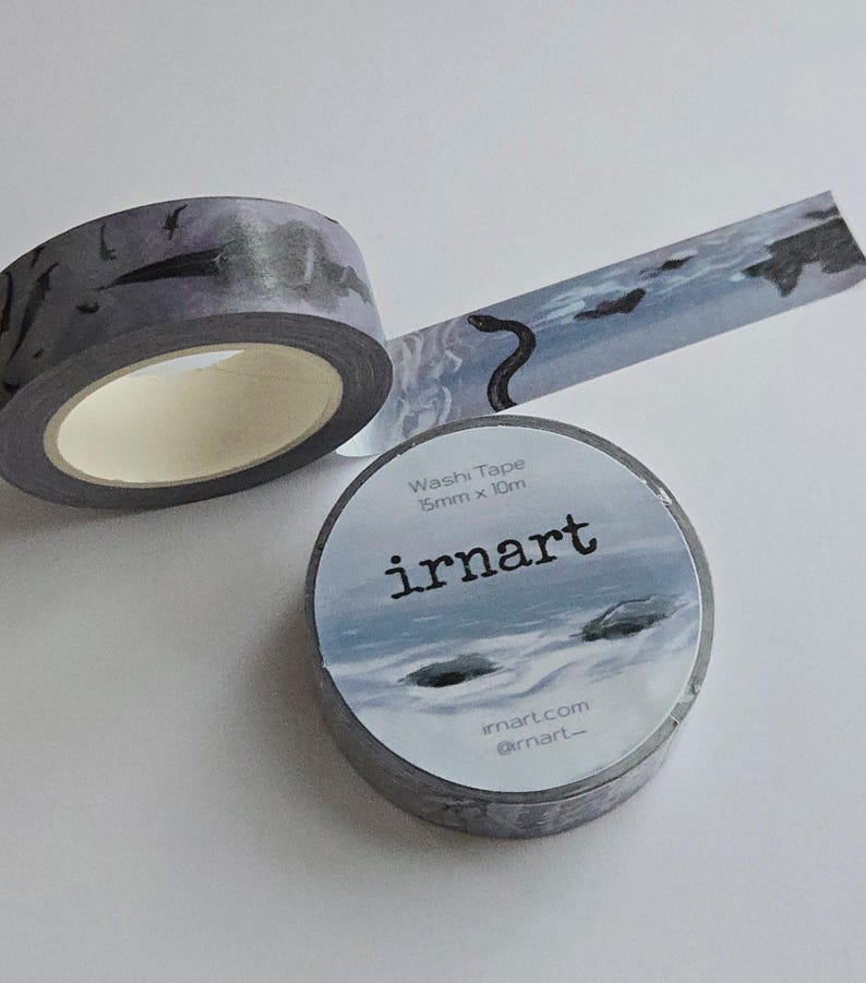 May include: Gray washi tape with a landscape design featuring a snake and birds. The tape roll has the text "irnart" and "Washi Tape 15mm x 10m". The tape is unrolled to show the design.