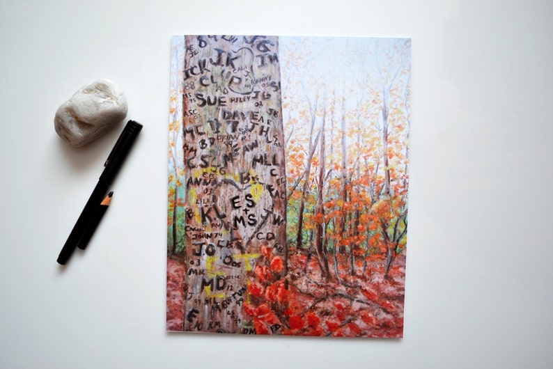May include: A painting of a forest scene with a tree trunk in the foreground. The tree trunk is covered in carved initials and hearts. The forest is in autumn colors with red, orange, and yellow leaves.