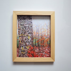 May include: A painting of a tree trunk with many names and initials carved into it. The tree is in a forest setting with fall foliage in shades of red, orange, and yellow.