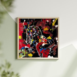 May include: Abstract art print in a light wood frame. The artwork features a figure with a white outline, filled with colourful brushstrokes of red, yellow, blue, and black. The background is a mix of red and black.