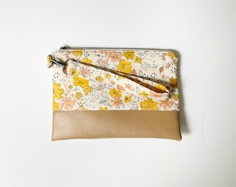 Pochette da polso floreale: fondo in similpelle, borsa a mano con cerniera
