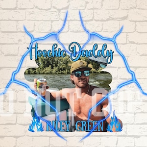 May include: A digital graphic featuring the text "Hoochie Daddy" in a script font, with "Riley Green" below. The image includes a person wearing sunglasses and a hat, holding a can of beer, with a river scene in the background.