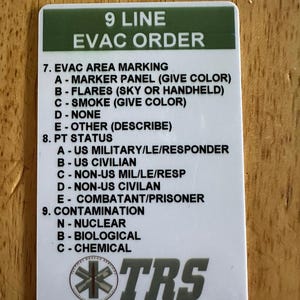 May include: A rectangular card with a green border and white interior, featuring the text "9 LINE EVAC ORDER." The card lists instructions for evacuation, including area marking, patient status, and contamination details. The bottom of the card displays the TRS logo and website address.