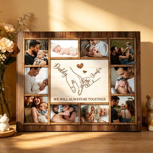 May include: A wooden photo frame with multiple openings, each holding a photograph of a baby with their parents. The center panel features the words "Daddy" and "Jennifer" with a drawing of hands holding each other, and the phrase "WE WILL ALWAYS BE TOGETHER".
