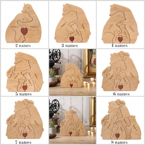 Peut inclure: Puzzle familial en bois en forme d'ours avec un c&oelig;ur rouge et un espace pour les noms. Disponible avec 2 &agrave; 8 noms. Les ours sont dans une pose c&acirc;line. Le texte "2 noms", "3 noms", "4 noms", "5 noms", "6 noms", "7 noms", et "8 noms" est visible.