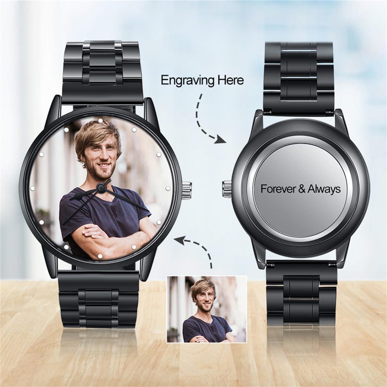 May include: Black wristwatch with a stainless steel strap. The watch face shows a colour photograph of a man. The back of the watch is engraved with the words "Forever & Always". The words "Engraving Here" are also visible.