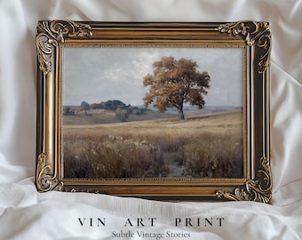 May include: A rectangular landscape painting in a dark brown and gold ornate frame. The artwork depicts a solitary tree in a golden field under a cloudy sky. Below the frame, the text reads VIN ART PRINT Subtle Vintage Stories.
