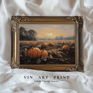 May include: A rectangular art print in an ornate, dark brown and gold frame featuring a landscape painting of a pumpkin patch at sunset. The text VIN ART PRINT and Subtle Vintage Stories is printed in black below the framed artwork.