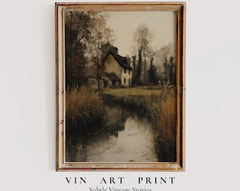 May include: Framed vintage art print featuring a serene landscape with a house near a body of water. The artwork has a muted color palette with brown, beige, and gray tones. The text "VIN ART PRINT" and "Subtle Vintage Stories" is at the bottom.
