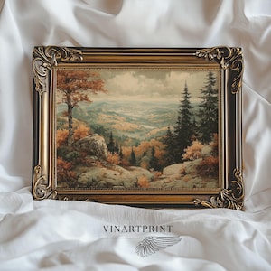 May include: A landscape painting in a dark, ornate, gold-accented frame depicting a mountain valley with autumn foliage, rocky foreground terrain, and evergreen trees under a cloudy sky. The text VINARTPRINT is printed below the frame.