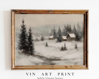 May include: A vintage winter landscape print in a wooden frame. The artwork depicts snow-covered cabins and evergreen trees in a serene, monochromatic scene. The text "VIN ART PRINT" and "Subtle Vintage Stories" is at the bottom.