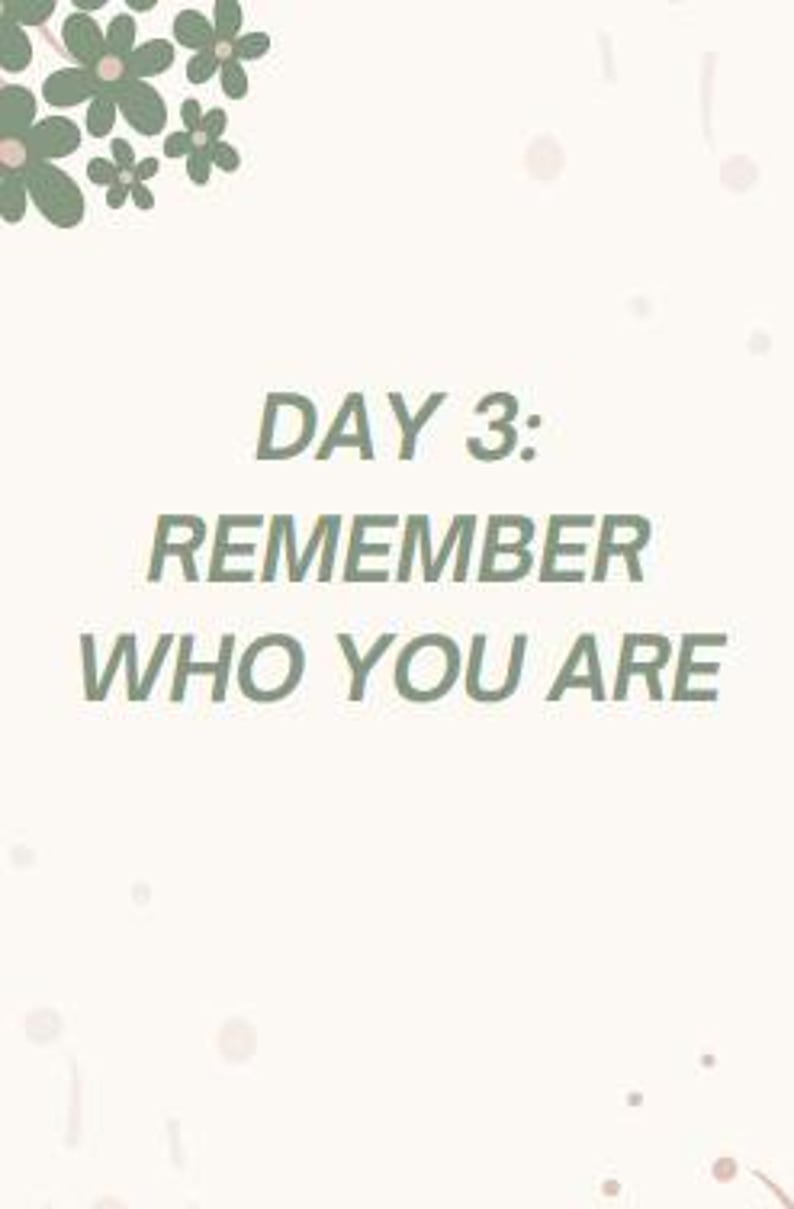 May include: A light cream-colored background with the text "DAY 3: REMEMBER WHO YOU ARE" in a muted green font. The top left corner features a cluster of stylized green flowers.