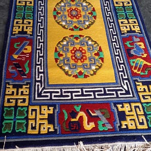 Indo-Tibetan Hand-Knotted Wool Rug – Traditional Yellow & Multicolor Carpet | Sacred Symbol Design Oriental Area Rug with Fringe all size.
