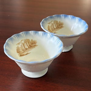 Pair of Macbeth-Evans Cremax Sherbet Dishes | Blue Border Castle Design | Opaque White Depression Glass | 1930s
