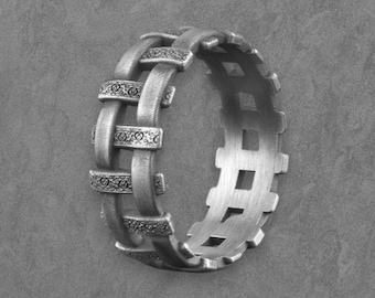 Anello ispirato all'ingranaggio steampunk: fascia a gabbia industriale con dettagli di rivetti ornamentali