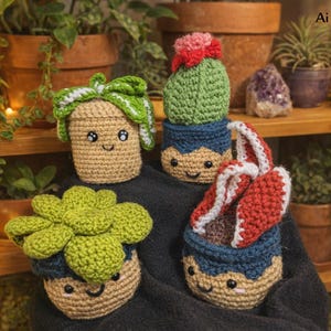 May include: Crocheted plant pot dolls with smiling faces. The dolls are in the shape of succulents and cacti, with green, blue, red, and tan colors. The dolls are on a shelf with real plants in terracotta pots.