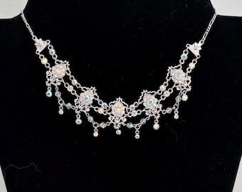 Collar vintage firmado por Butler AB con diamantes de imitación, estilo festón en tono plateado.