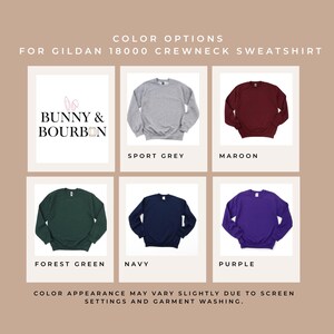 May include: Image showcasing color options for Gildan 18000 crewneck sweatshirts. Colors include sport grey, maroon, forest green, navy, and purple. The image also features the text "Bunny & Bourbon".