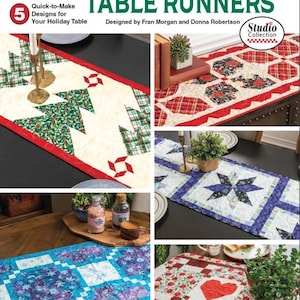 May include: A Fabric Cafe Festive Gatherings Table Runners pattern book featuring five quilt designs. The cover displays various quilted runners with holiday themes, including Christmas trees, red hearts, and geometric star patterns in red, green, blue, and white.