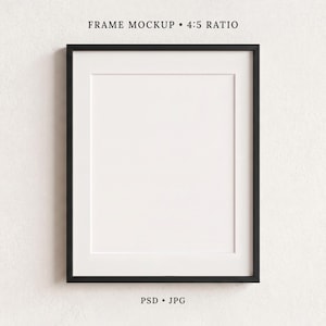 May include: A black picture frame with a white mount, featuring a vertical rectangular aperture. The text FRAME MOCKUP 4:5 RATIO is printed above the frame, and the text PSD JPG is printed below the frame on a plain white background.