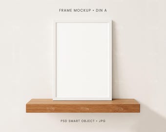 A4 White Frame Mockup PSD JPG Leaning on Rustic Wood Shelf