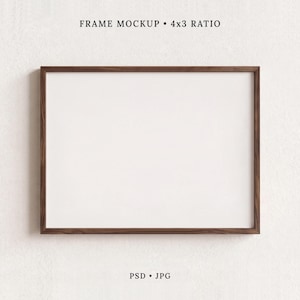 May include: A rectangular wooden picture frame with a white center, featuring the text FRAME MOCKUP 4x3 RATIO at the top and PSD JPG at the bottom. The frame has a dark brown wood grain finish and is oriented horizontally against a plain background.
