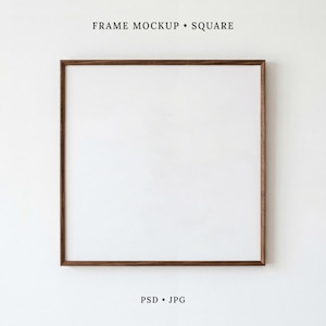 May include: A square wooden picture frame with a white center area. The text FRAME MOCKUP SQUARE is printed above the frame, and the text PSD JPG is printed below the frame. The frame has a thin, dark brown wood border and a plain white interior.